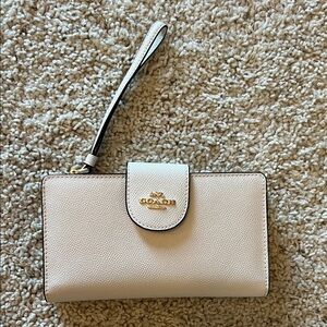 Coach Beige Wristlet with Gold Accents